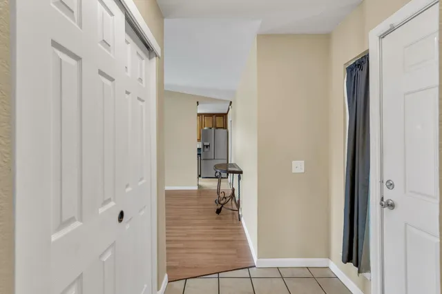 a view of a bathroom from the hallway