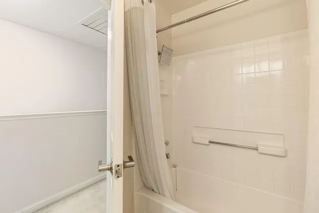 a outdoor space with patio furniture and white umbrellas