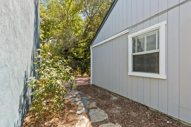 a view of backyard with green space