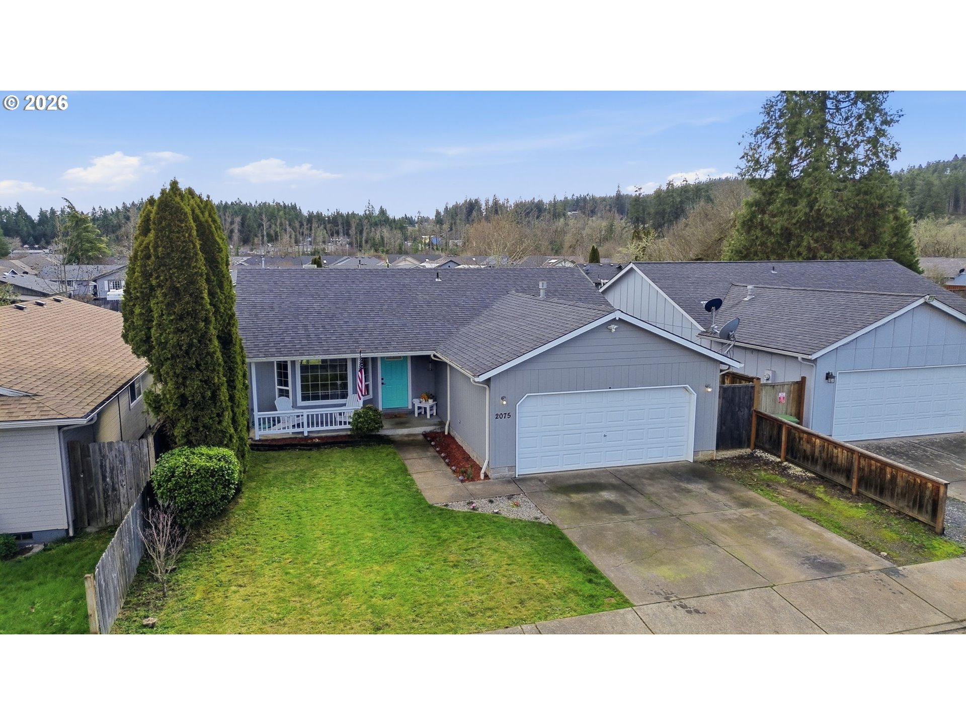 2075 Bryant Avenue Cottage Grove, OR 97424 - Photo 26 of 29 a view of a house with a big yard