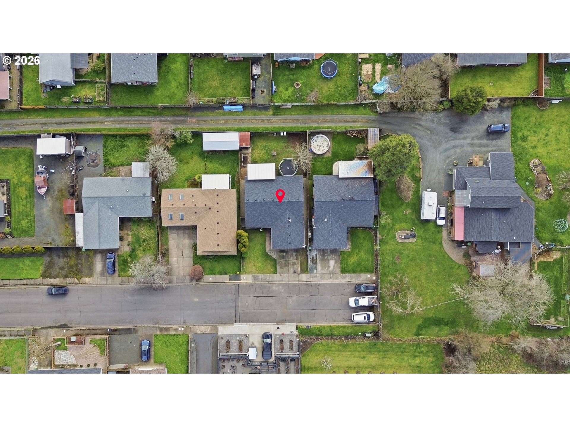 2075 Bryant Avenue Cottage Grove, OR 97424 - Photo 27 of 29 an aerial view of a house with a garden