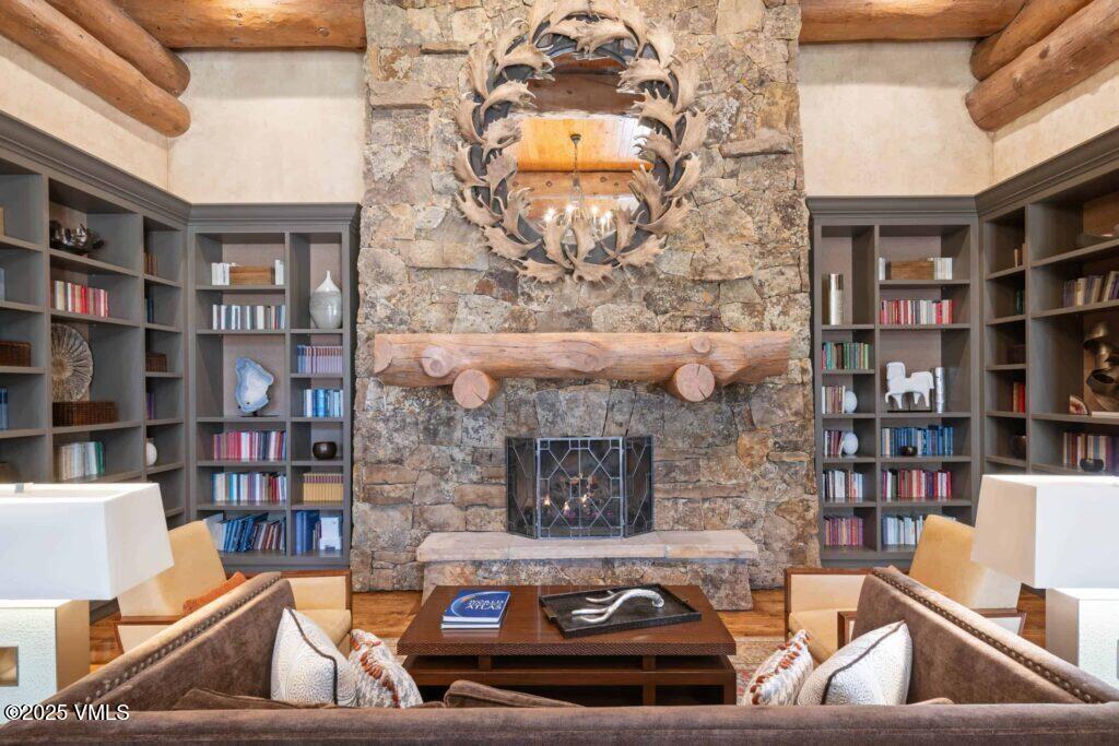 100 Bachelor Ridge Road, Unit 3508/09 Avon, CO 81620 - Photo 23 of 33 a living room with furniture and a fireplace