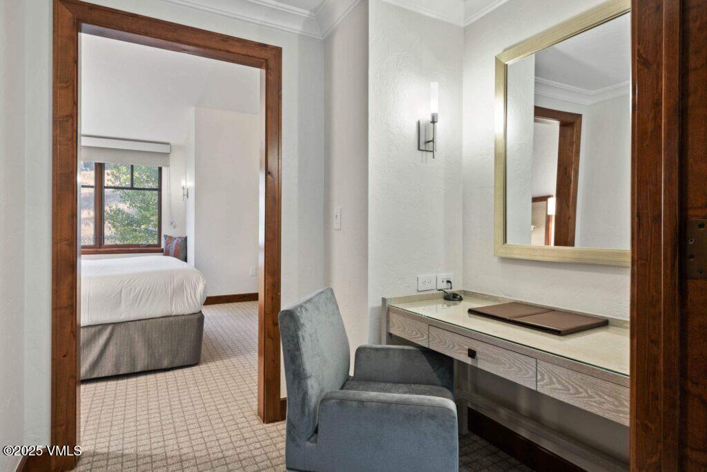 100 Bachelor Ridge Road, Unit 3508/09 Avon, CO 81620 - Photo 10 of 33 a bedroom with a bed and a table