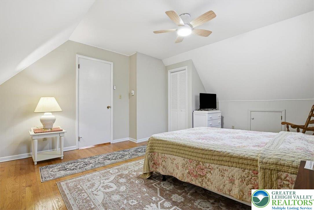 20 Pool Drive Jim Thorpe, PA 18229 - Photo 28 of 44 a bedroom with a bed and a lamp on table