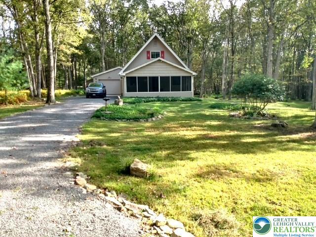 20 Pool Drive Jim Thorpe, PA 18229 - Photo 3 of 44 a front view of house with garden