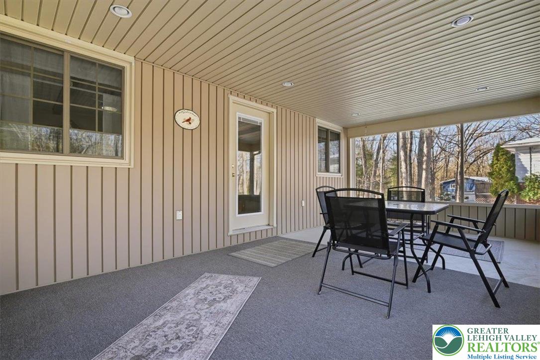 20 Pool Drive Jim Thorpe, PA 18229 - Photo 7 of 44 a view of a patio with table and chairs and potted plants