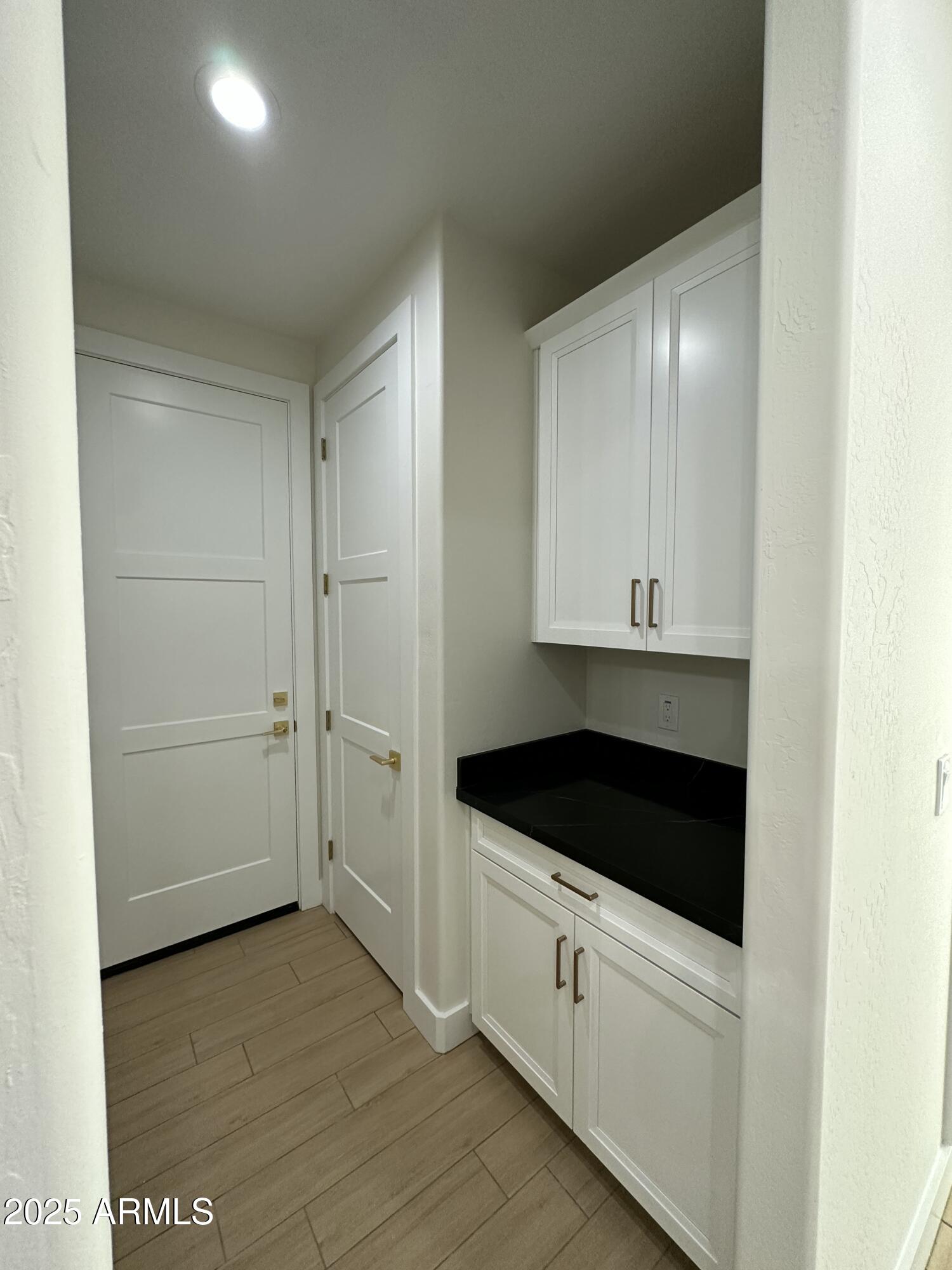 5749 North Nigal Road Casa Grande, AZ 85194 - Photo 15 of 15 a kitchen with a sink and cabinets