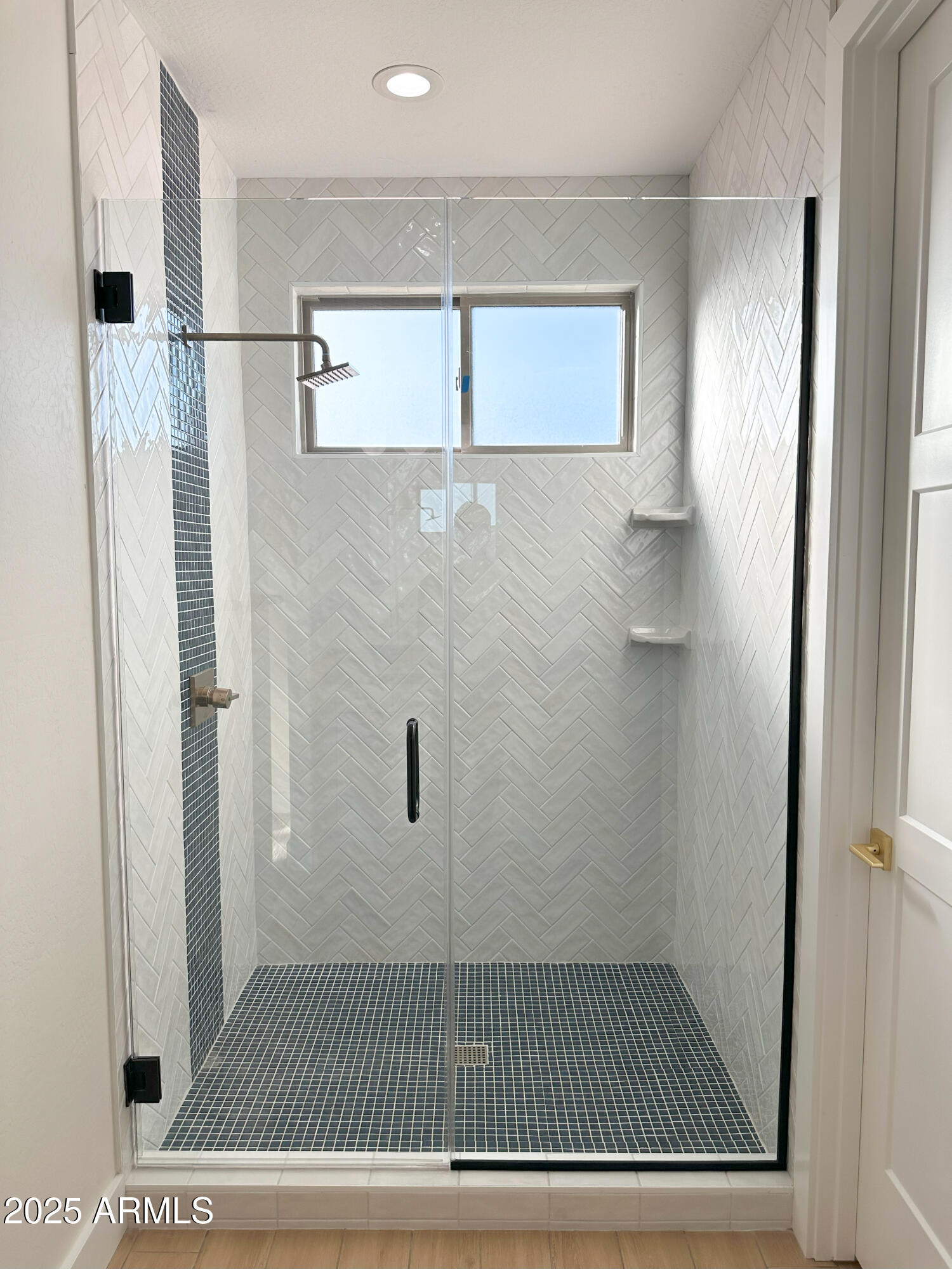 5749 North Nigal Road Casa Grande, AZ 85194 - Photo 6 of 15 a bathroom with a glass shower door