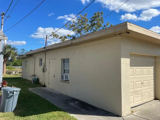 a view of a house with a garage