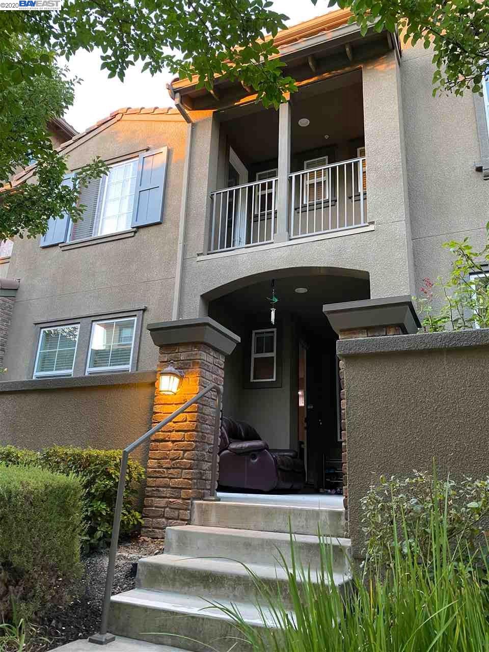 5078 Fioli Loop San Ramon, CA 94582 - Photo 1 of 1 a front view of a house with a yard