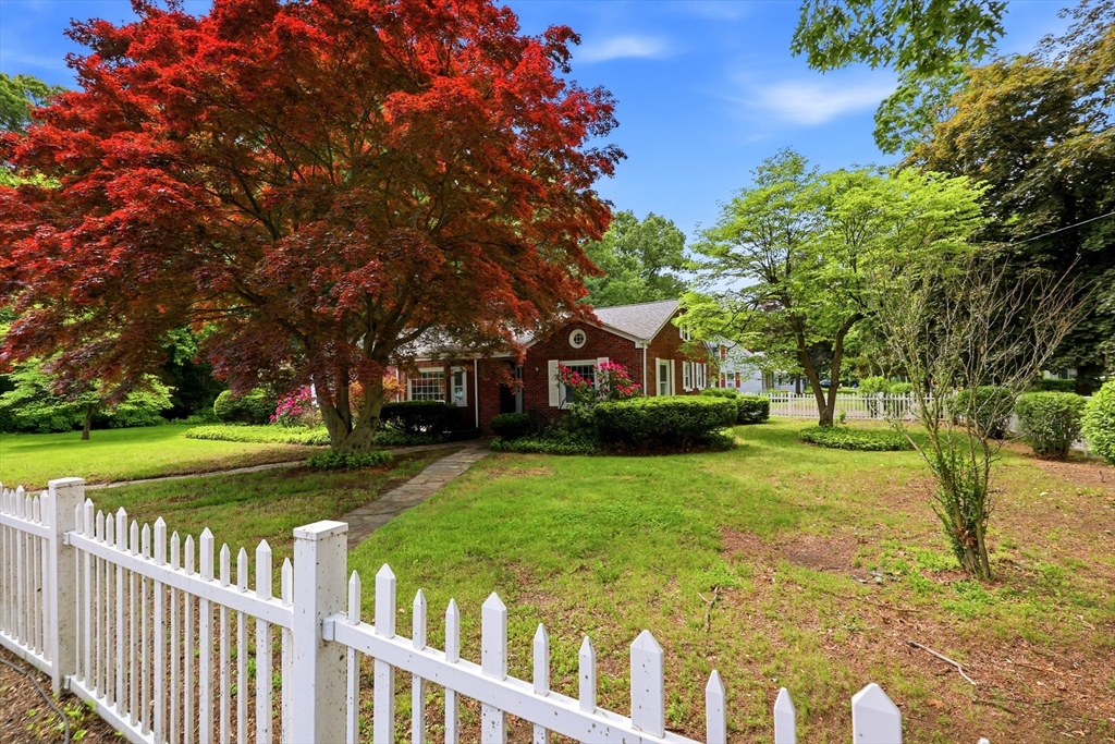 130 Connecticut Avenue Springfield, MA 01107 - Photo 4 of 40 a view of a house with a big yard and large trees