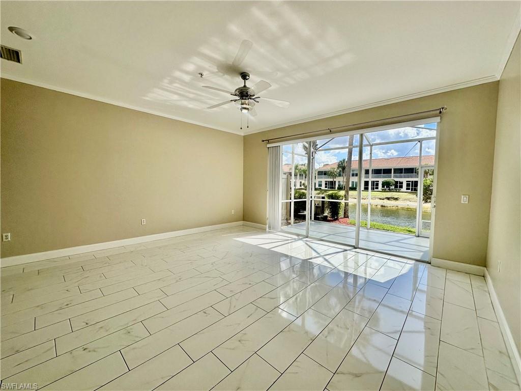 996 Hampton Circle, Unit 71 Naples, FL 34105 - Photo 6 of 30 a view of a livingroom with a furniture