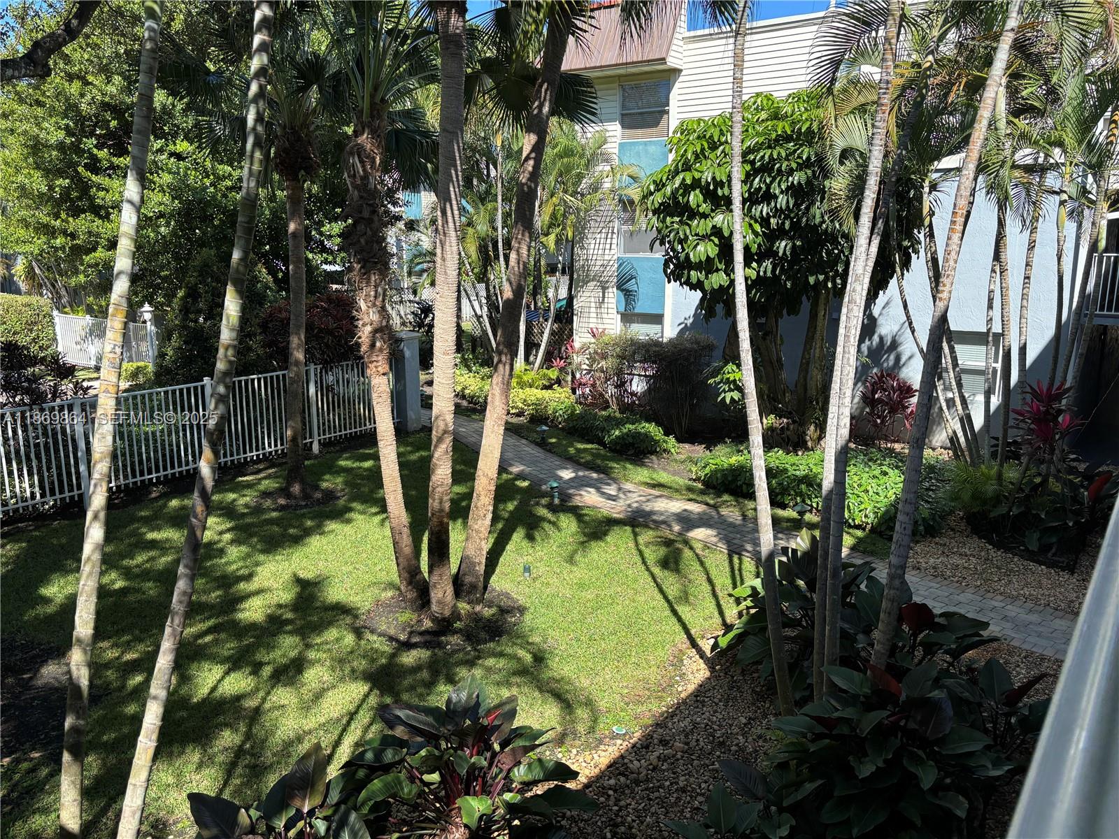 4600 Southwest 67th Avenue, Unit 212 Miami, FL 33155 - Photo 17 of 21 a view of a garden