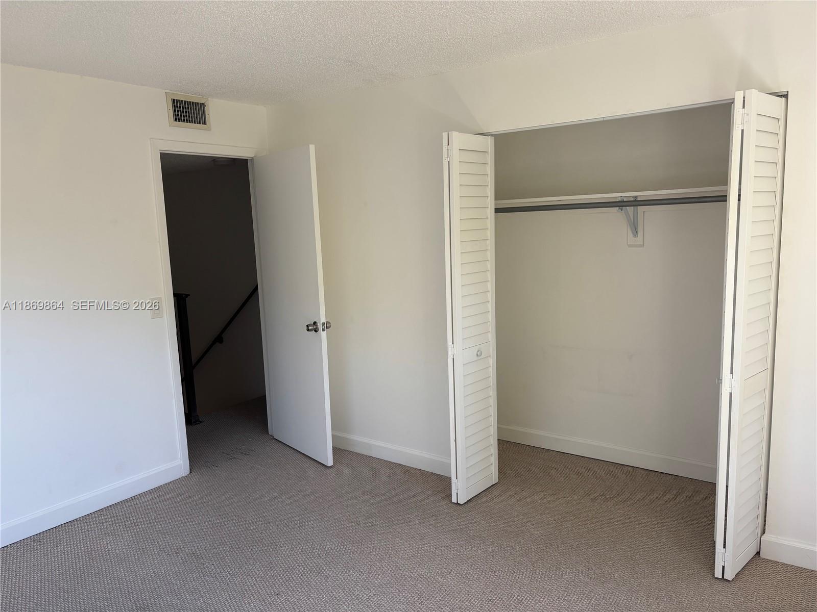 4600 Southwest 67th Avenue, Unit 212 Miami, FL 33155 - Photo 8 of 23 a view of closet area