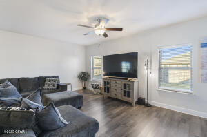 113 Ridgeway Circle Crestview, FL 32536 - Photo 18 of 55 a living room with furniture and a flat screen tv