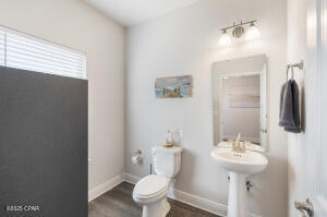 113 Ridgeway Circle Crestview, FL 32536 - Photo 26 of 55 a bathroom with a sink toilet and shower