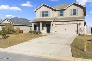 113 Ridgeway Circle Crestview, FL 32536 - Photo 4 of 55 a front view of a house with a yard