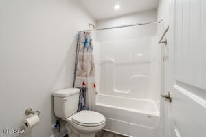 113 Ridgeway Circle Crestview, FL 32536 - Photo 45 of 55 a white toilet sitting next to a bath tub