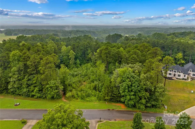 a view of a lake with a city