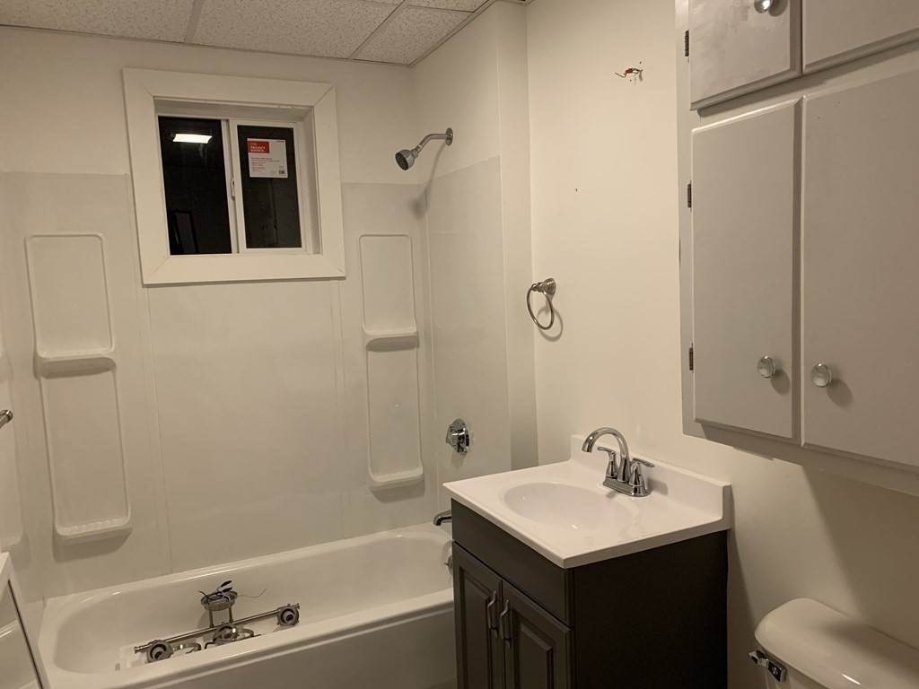 44 Crawford Street, Unit 3 Fall River, MA 02724 - Photo 7 of 8 a bathroom with a sink toilet and shower
