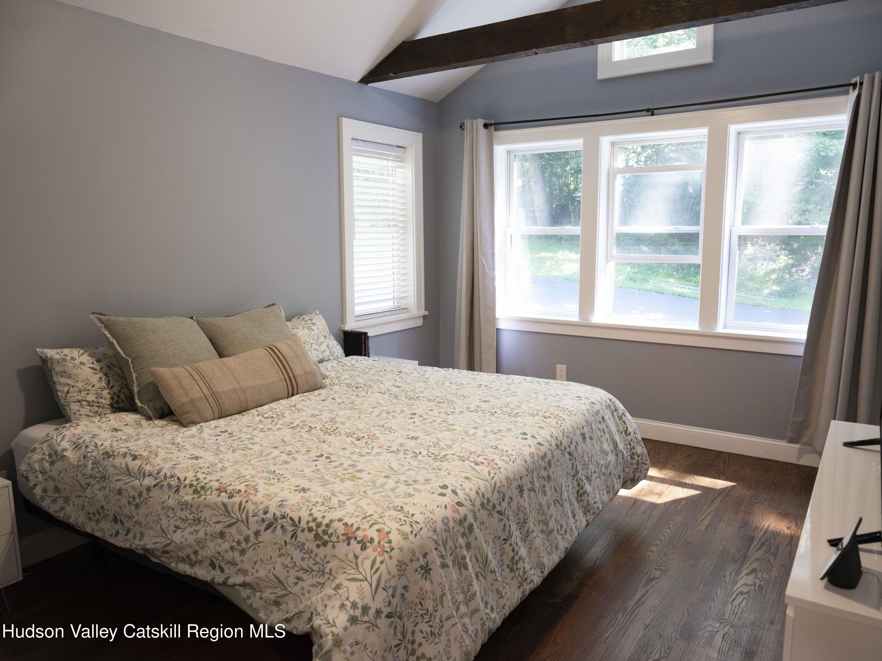 159 Ketchamtown Road Wappingers Falls, NY 12590 - Photo 14 of 31 a bedroom with a bed and a window