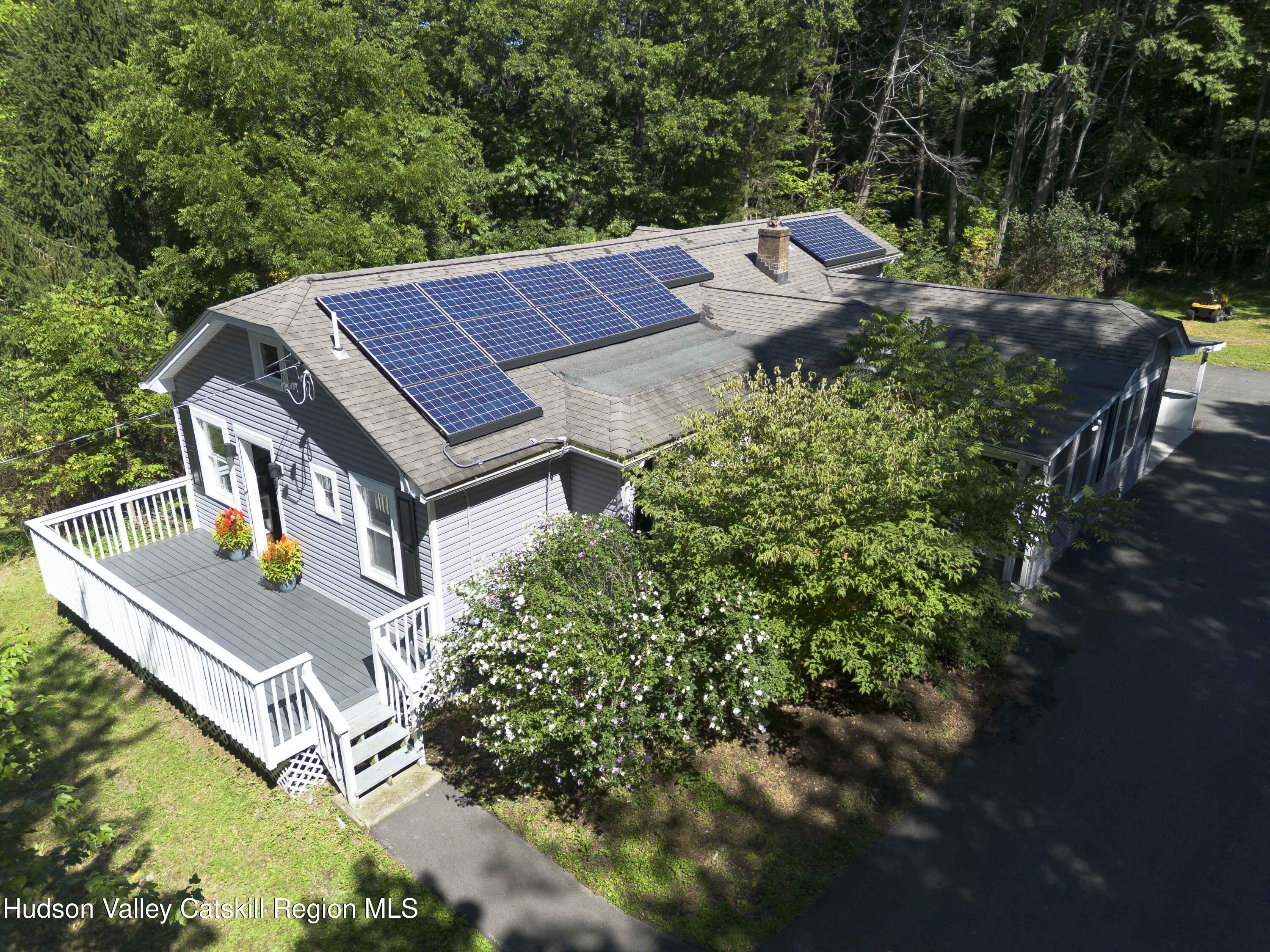 159 Ketchamtown Road Wappingers Falls, NY 12590 - Photo 25 of 31 a view of a patio with table and chairs and potted plants
