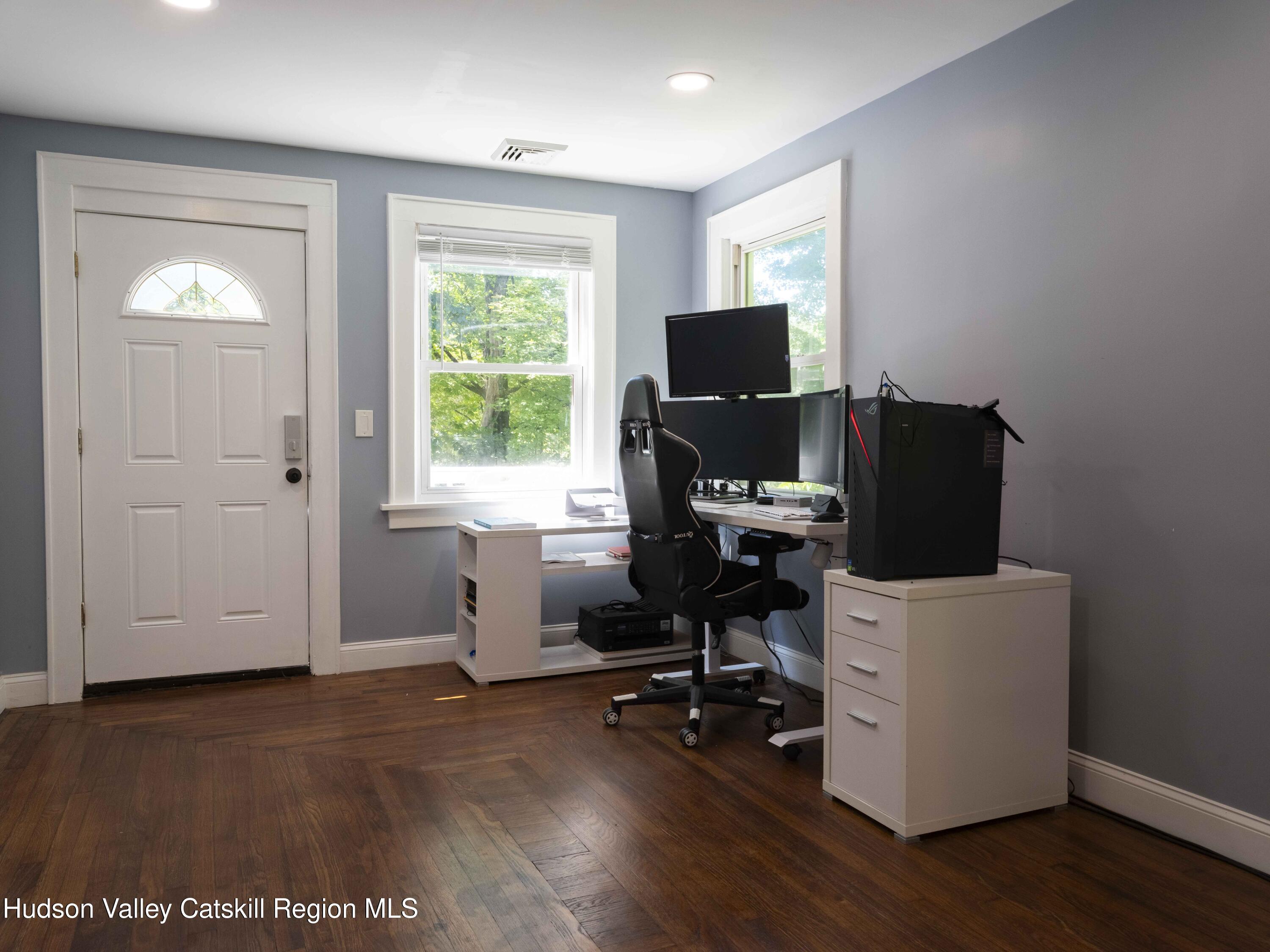 159 Ketchamtown Road Wappingers Falls, NY 12590 - Photo 4 of 31 a view of a workspace with furniture and a window
