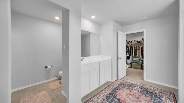 a bathroom with a sink and a toilet