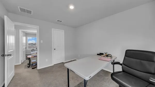 a room with furniture and a table