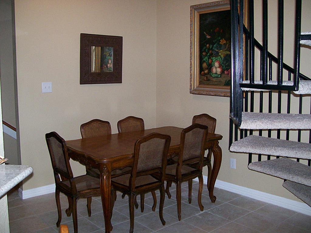811 Bradford Avenue, Unit 5B Kemah, TX 77565 - Photo 11 of 22 a view of a a dining room with furniture and front door
