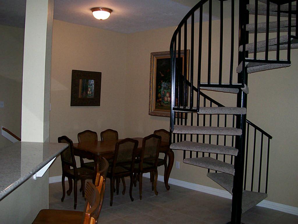 811 Bradford Avenue, Unit 5B Kemah, TX 77565 - Photo 10 of 22 a view of a dining room with furniture