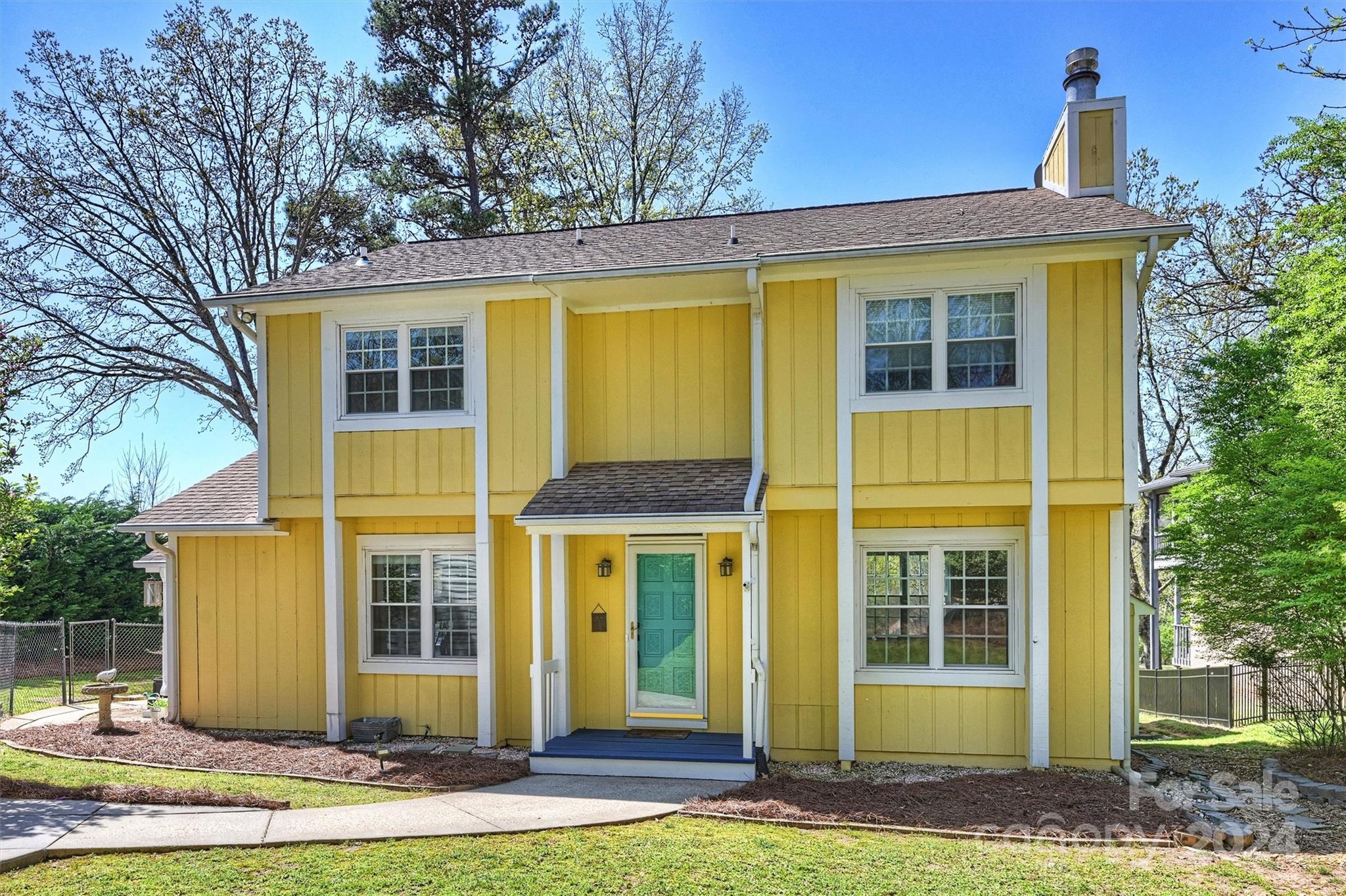 a view of a house with a garden