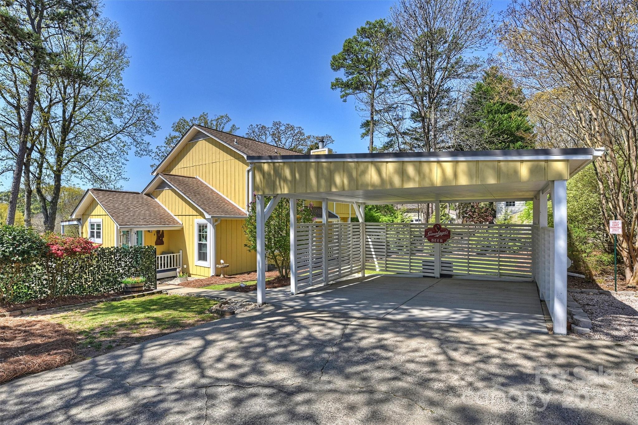 1190 Molokai Drive Tega Cay, SC 29708 - Photo 2 of 46 a backyard of a house with lots of green space