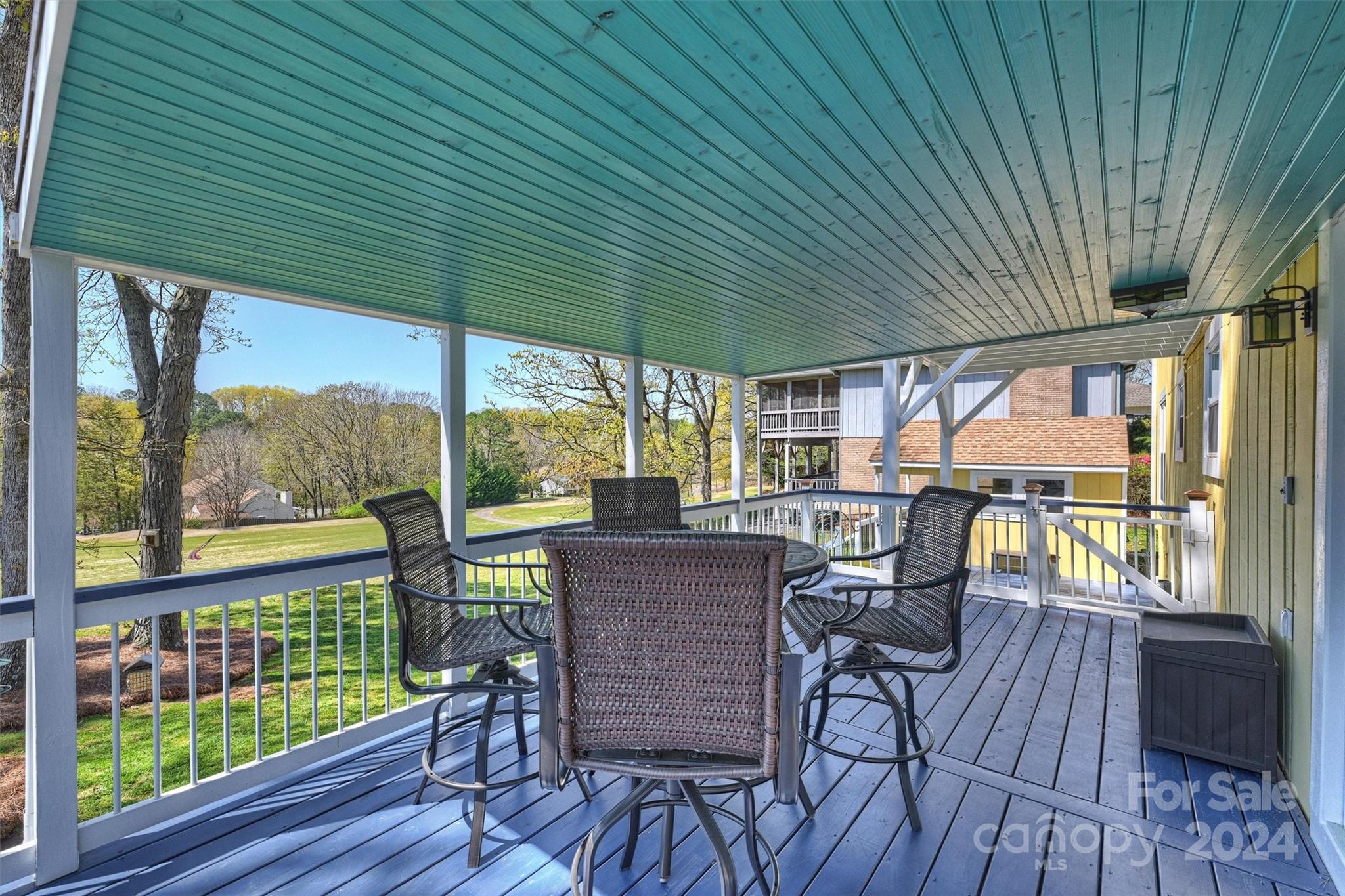 1190 Molokai Drive Tega Cay, SC 29708 - Photo 30 of 46 a view of a chairs and table in the balcony