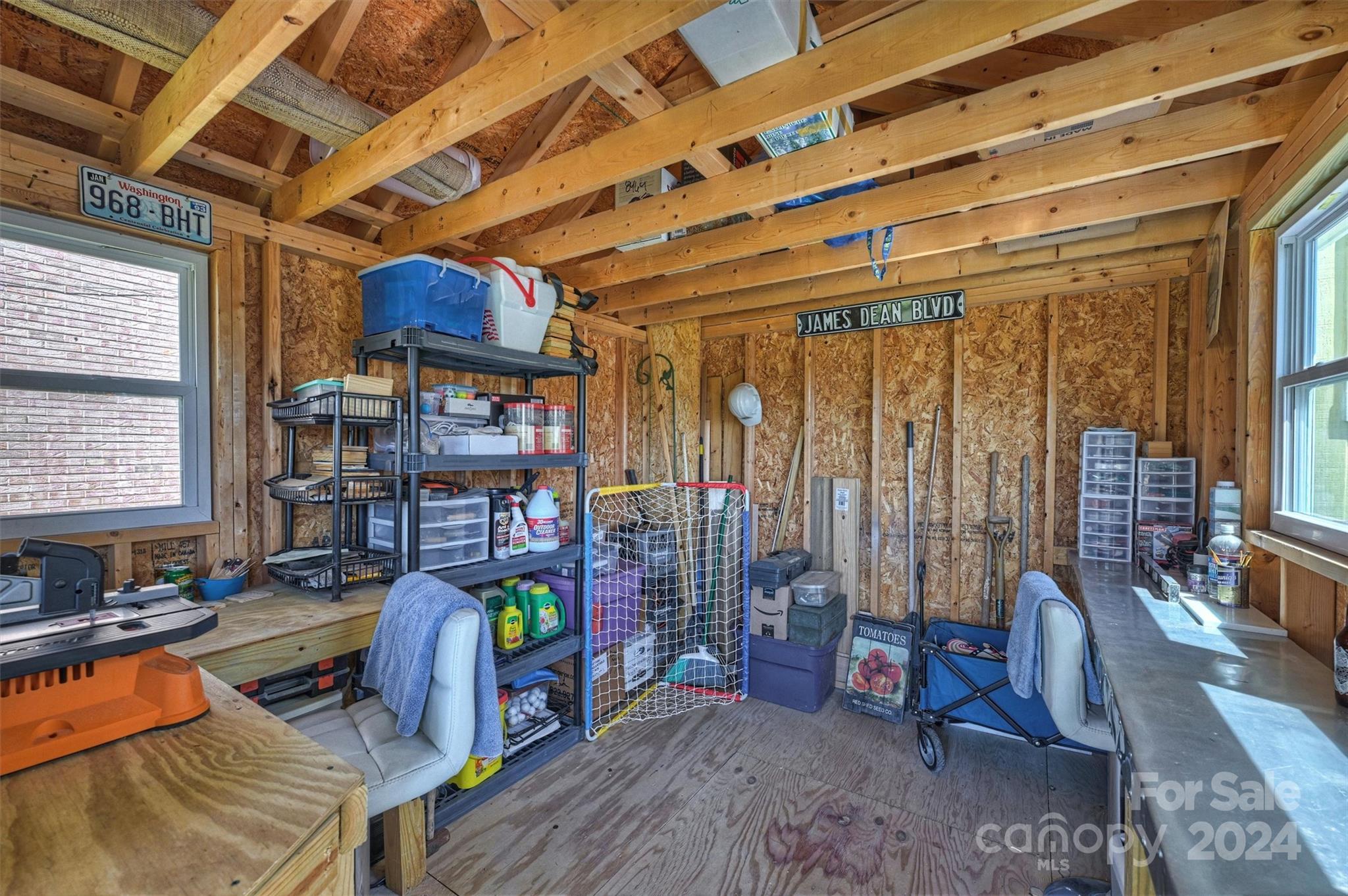 1190 Molokai Drive Tega Cay, SC 29708 - Photo 32 of 46 a living room with patio furniture and a wooden floor