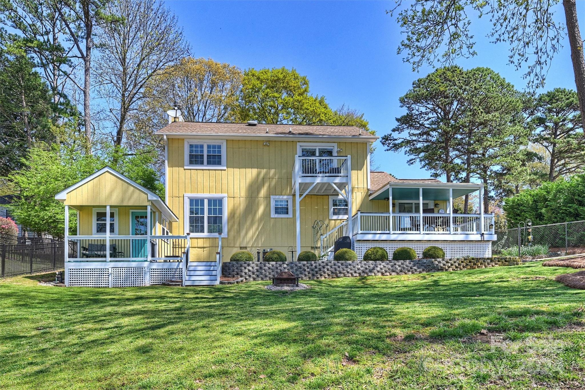 1190 Molokai Drive Tega Cay, SC 29708 - Photo 37 of 46 a front view of house with yard and green space