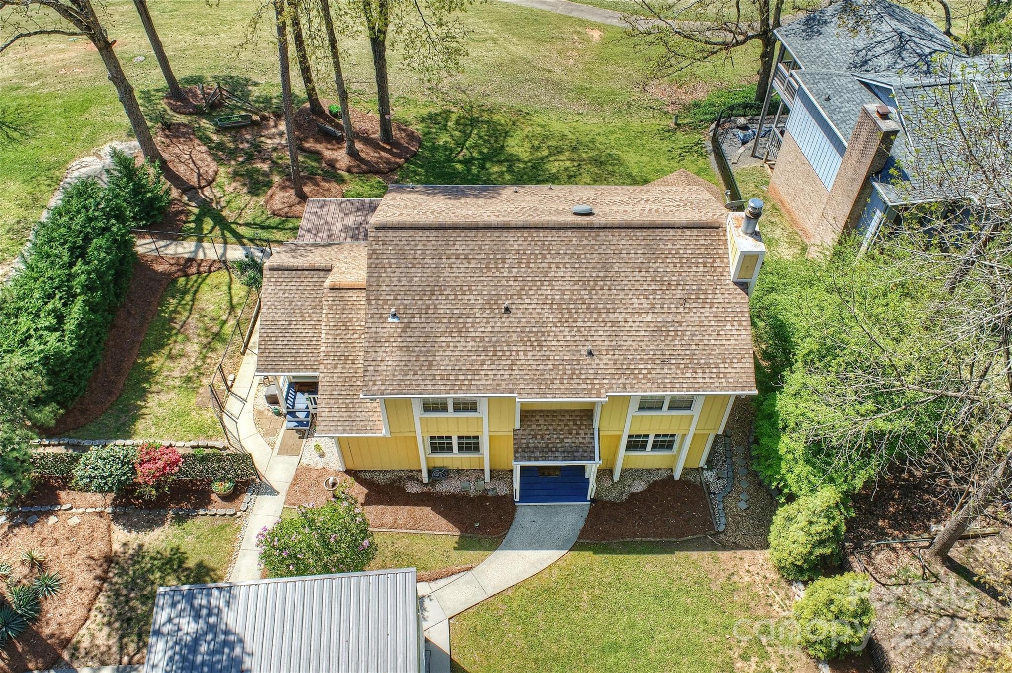 1190 Molokai Drive Tega Cay, SC 29708 - Photo 39 of 46 aerial view of a house with a yard and potted plants