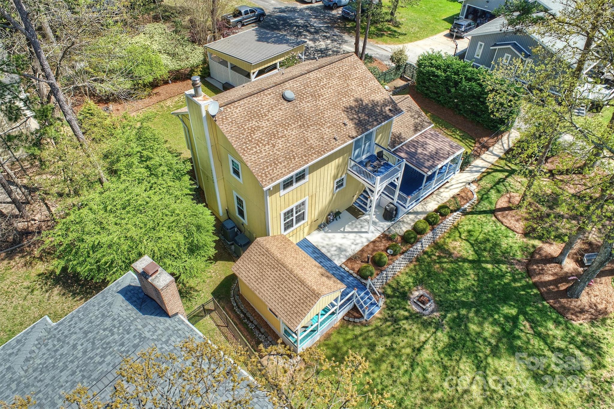 1190 Molokai Drive Tega Cay, SC 29708 - Photo 42 of 46 an aerial view of a house with garden space and street view