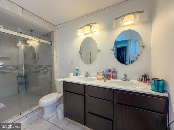 an oven with a dining table and chairs in it