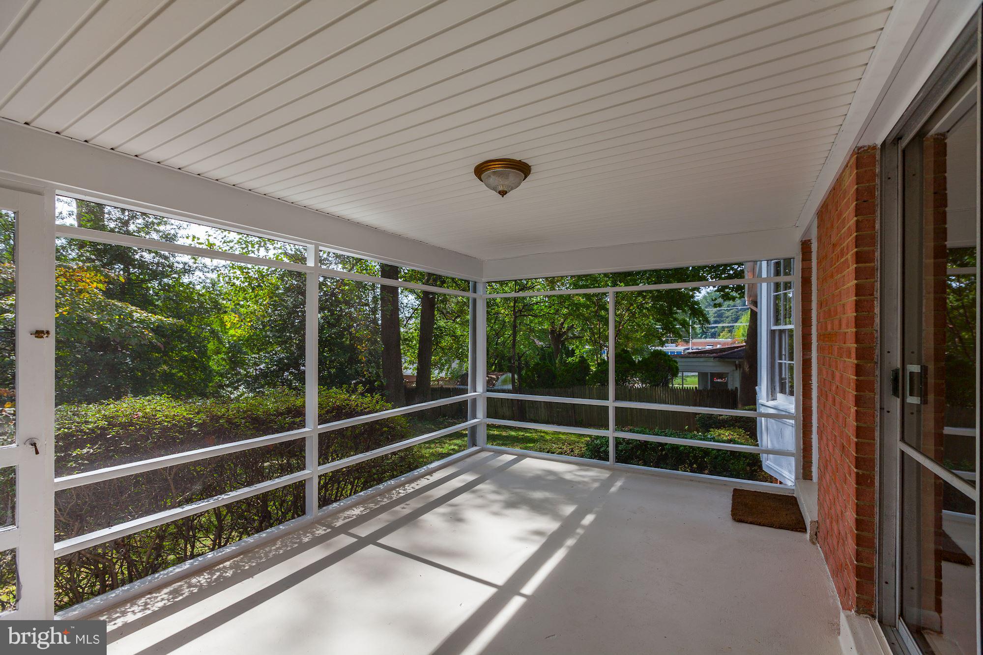 6216 Plainview Road Bethesda, MD 20817 - Photo 10 of 26 Scireened Porch off of Kitchen/Dining Room