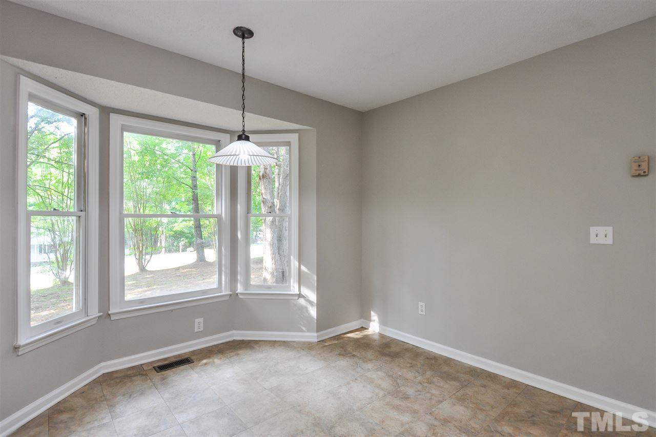 5208 Relay Way Raleigh, NC 27603 - Photo 11 of 25 a view of an empty room with windows