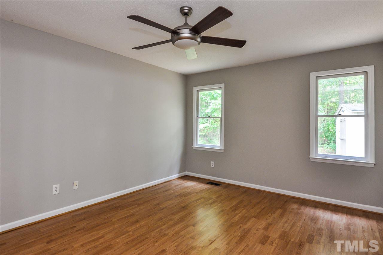 5208 Relay Way Raleigh, NC 27603 - Photo 15 of 25 wooden floor in an empty room with a window