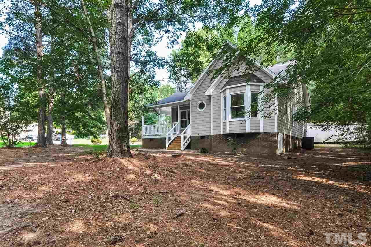5208 Relay Way Raleigh, NC 27603 - Photo 20 of 25 a view of a house with a yard