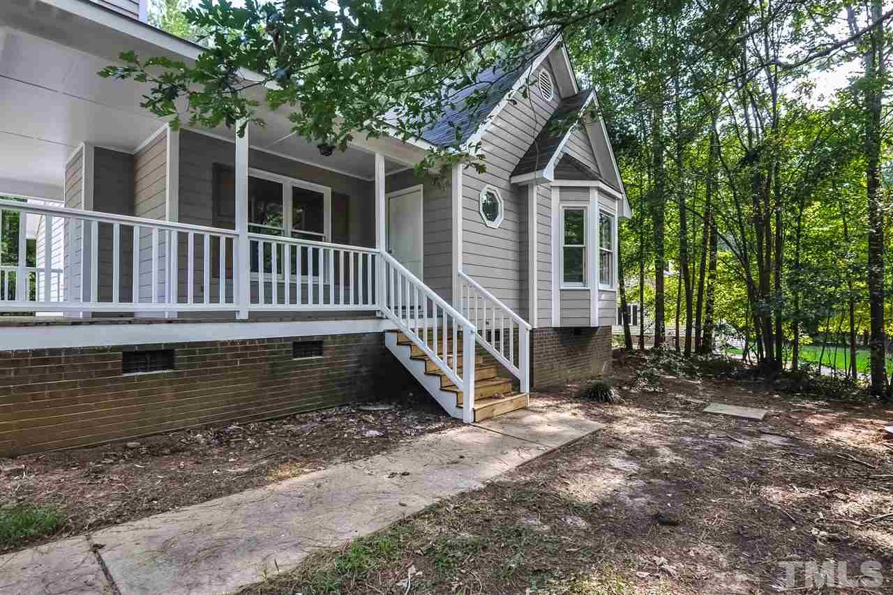 5208 Relay Way Raleigh, NC 27603 - Photo 21 of 25 a view of a house with a yard deck and a backyard