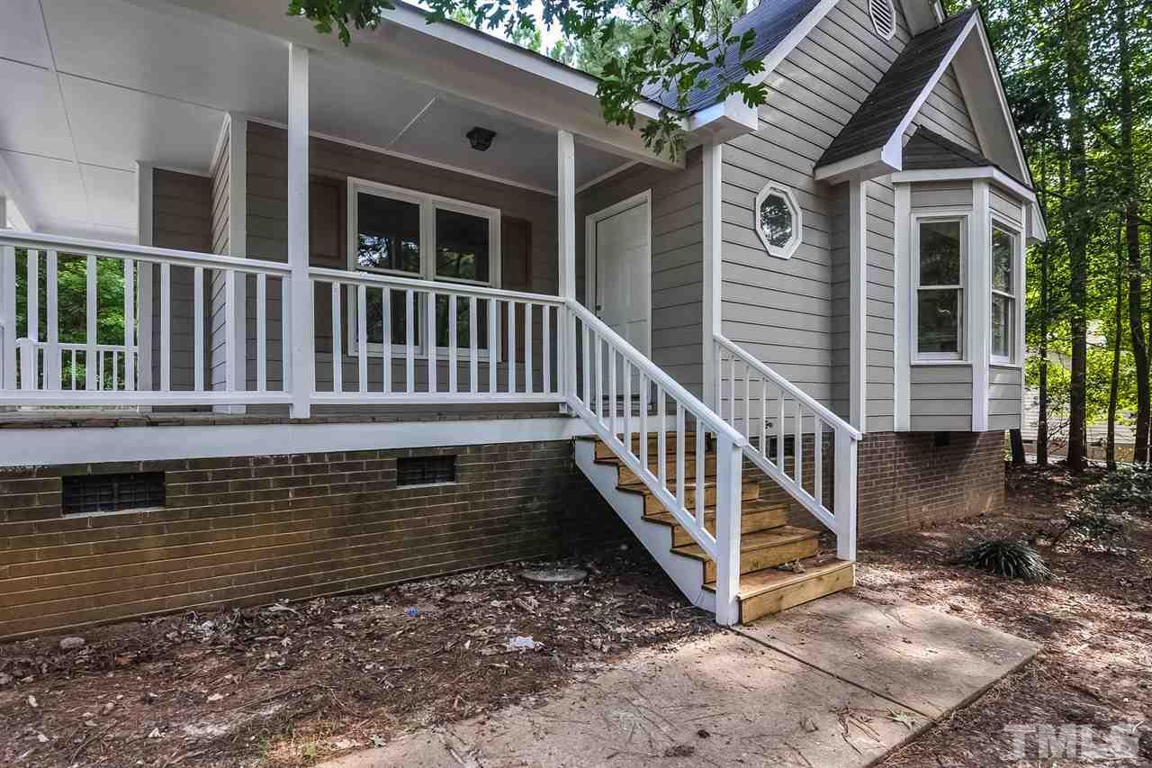 5208 Relay Way Raleigh, NC 27603 - Photo 23 of 25 a view of a house with wooden fence