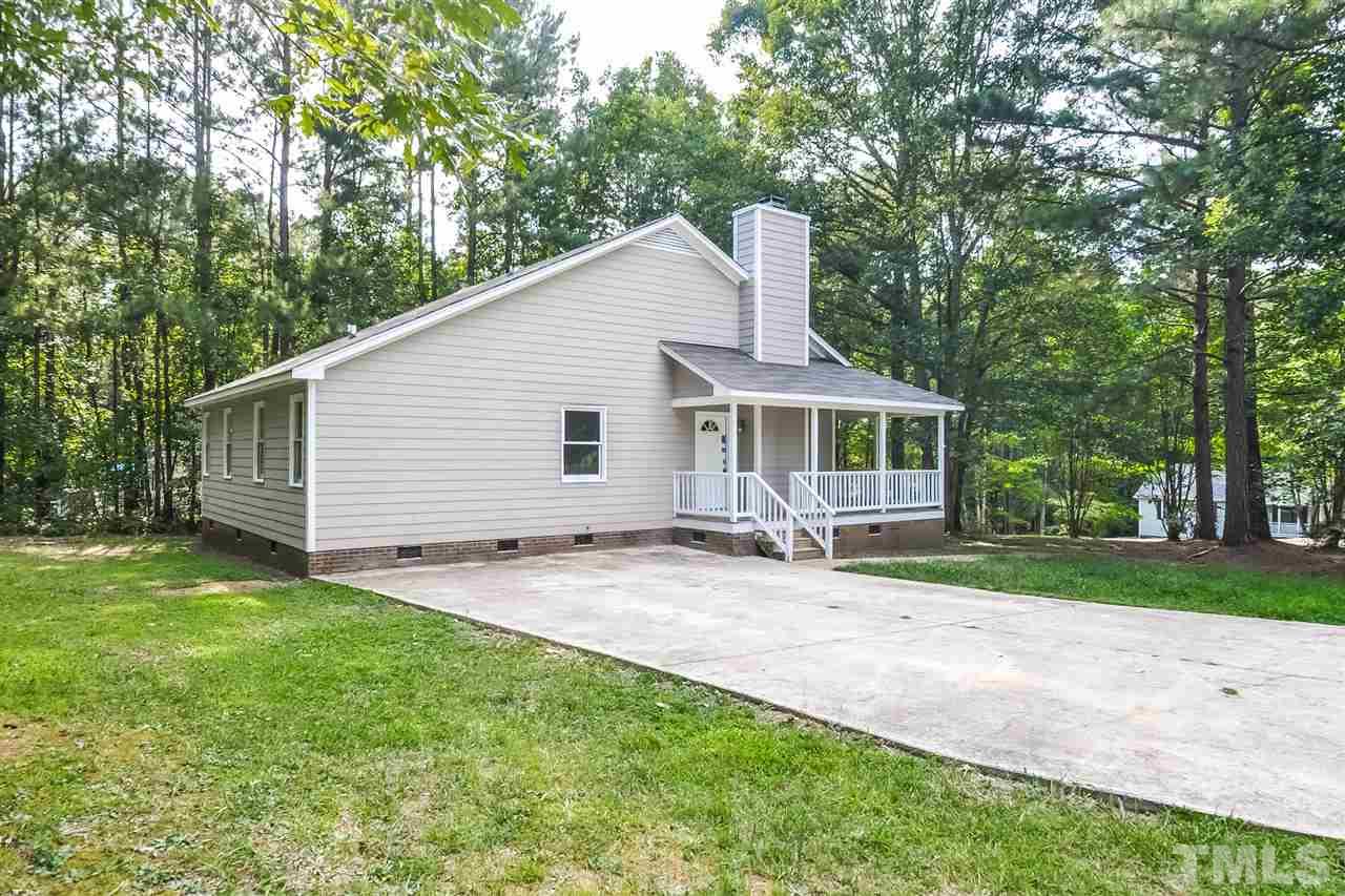 5208 Relay Way Raleigh, NC 27603 - Photo 25 of 25 a view of a house with a yard and sitting area