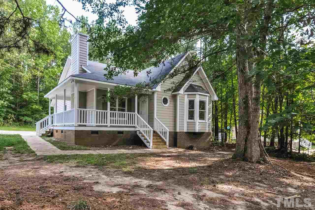 5208 Relay Way Raleigh, NC 27603 - Photo 5 of 25 a front view of a house with a yard