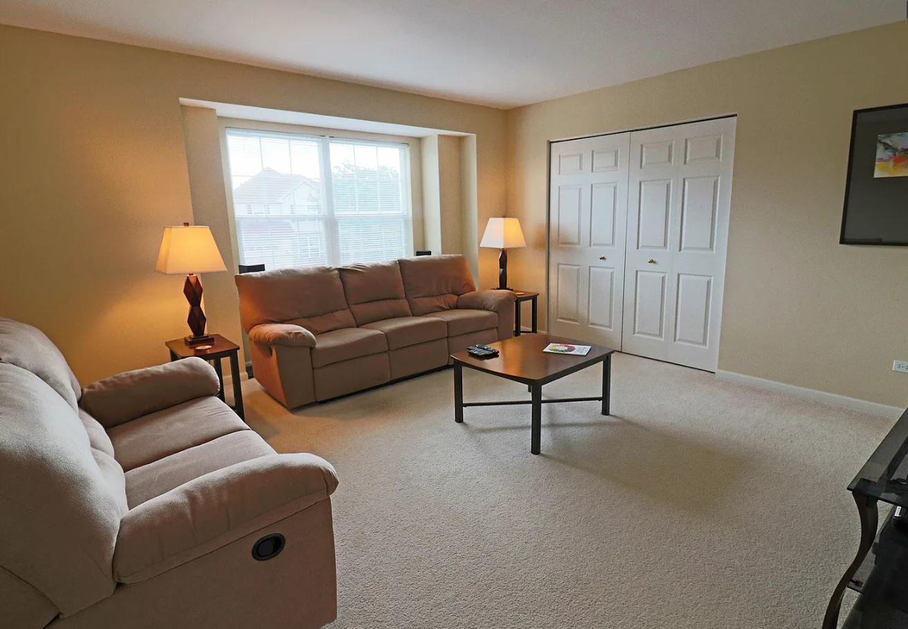 37076 North Bonnie Brae Road Lake Villa, IL 60046 - Photo 11 of 17 a living room with furniture and a window