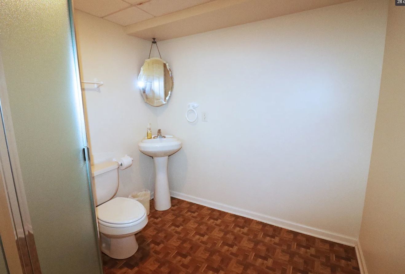 37076 North Bonnie Brae Road Lake Villa, IL 60046 - Photo 15 of 17 a bathroom with a toilet and a sink