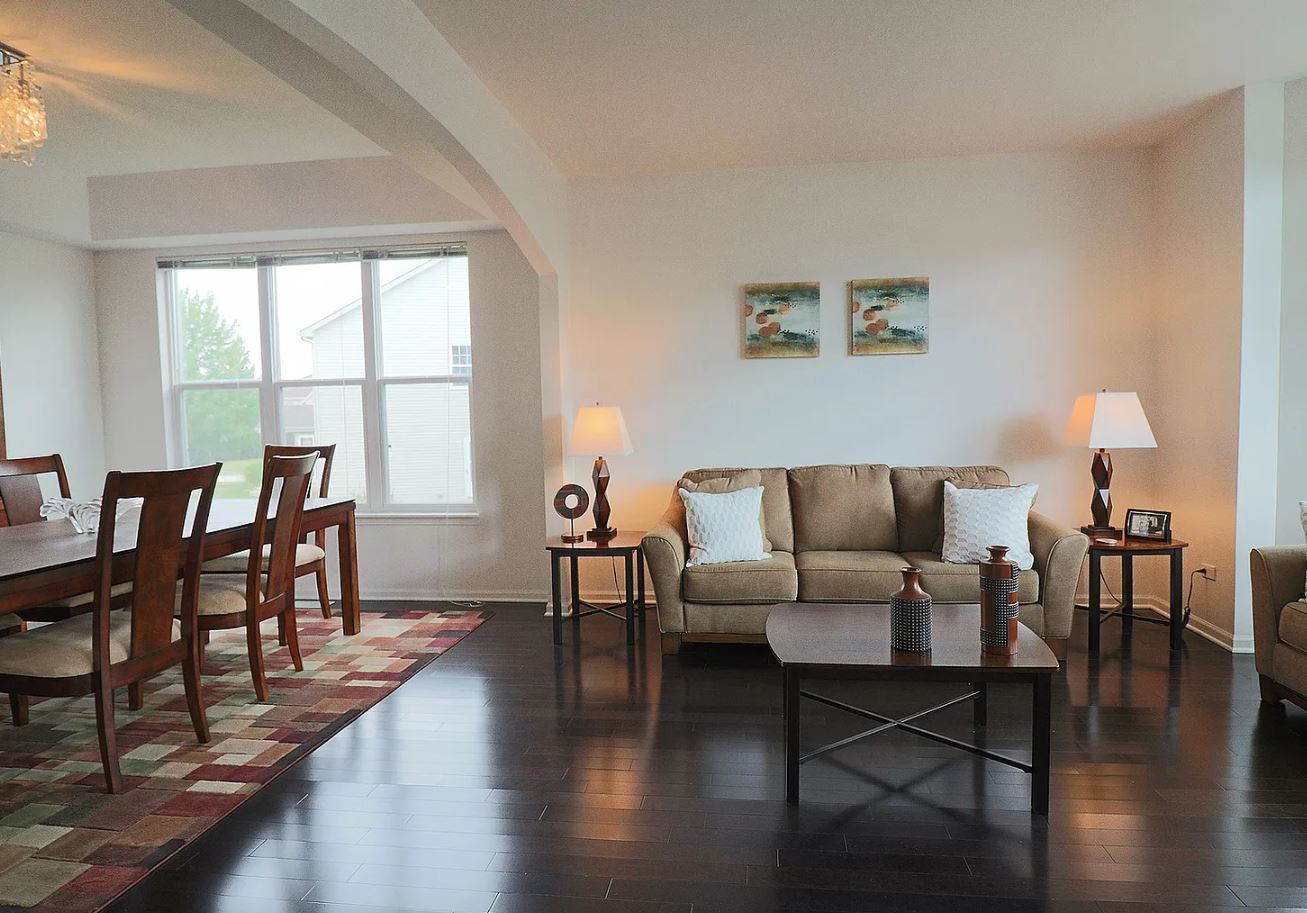 37076 North Bonnie Brae Road Lake Villa, IL 60046 - Photo 3 of 17 a living room with furniture wooden floor and a window